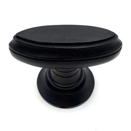 Knopkruk ebbenhout zwart op rond rozet ovaal met freesrand (1 paar) 82x32mm